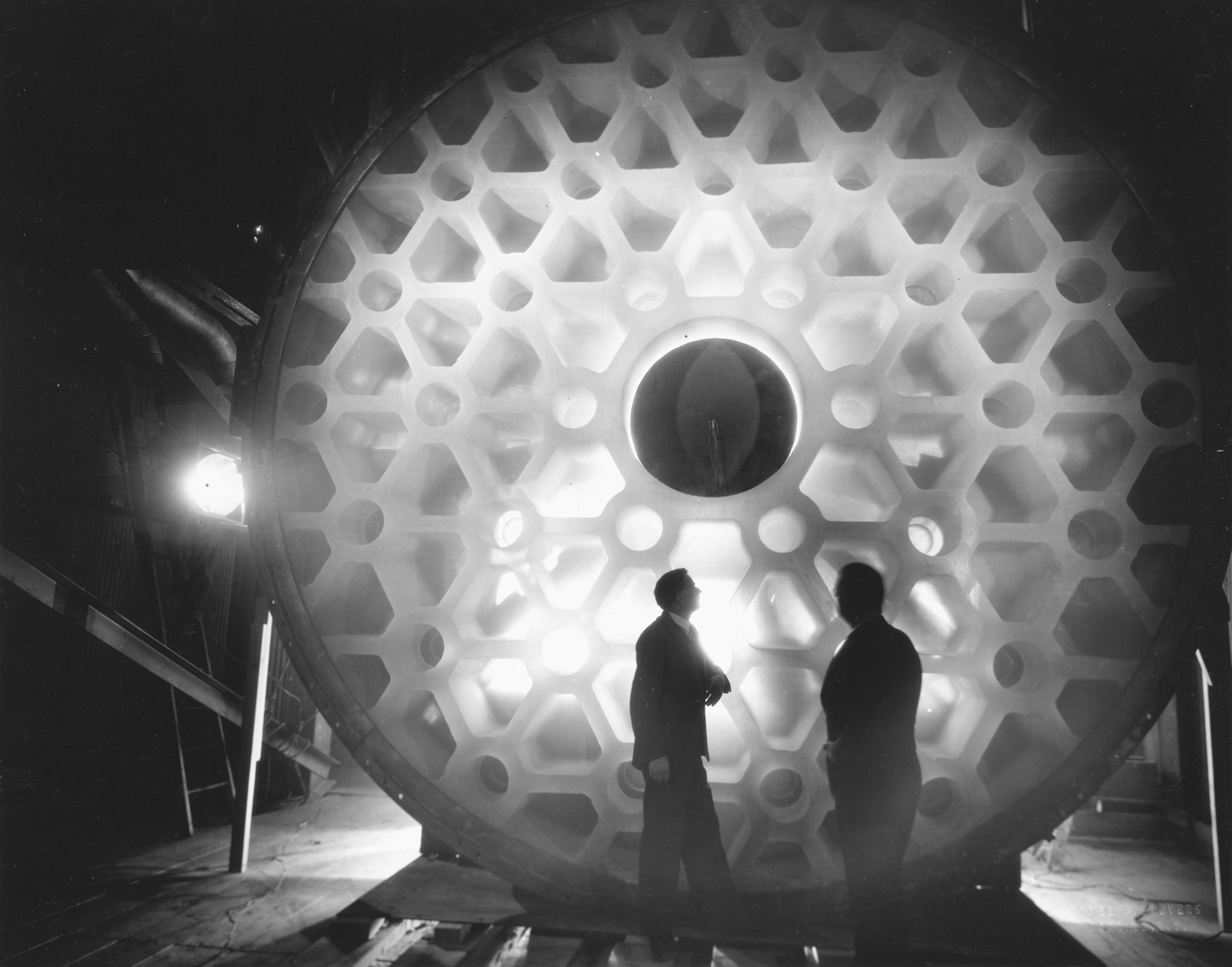 Drs. George V. McCauley and John Clyde Hostetter Inspect the Disc
