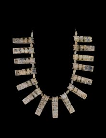 Necklace with Glass Pendants and Faience Beads, mold-pressed. Southern Greece or Crete, 1400–1250 B.C. Pendants: L. 6 cm, W. 1.9 cm; faience beads: L. 2 cm. Collection of The Corning Museum of Glass, 66.1.196.