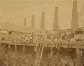 Workers pose at Corning Glass Works construction site, 1889