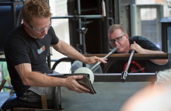 Glassmakers Chris Rochelle and George Kennard work with designer Marc Thorpe during GlassLab in Corning