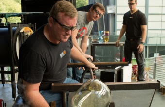 Glassmakers George Kennard and Tom Ryder work with Harry Allen and Chris Hacker at GlassLab in Corning, August 2012